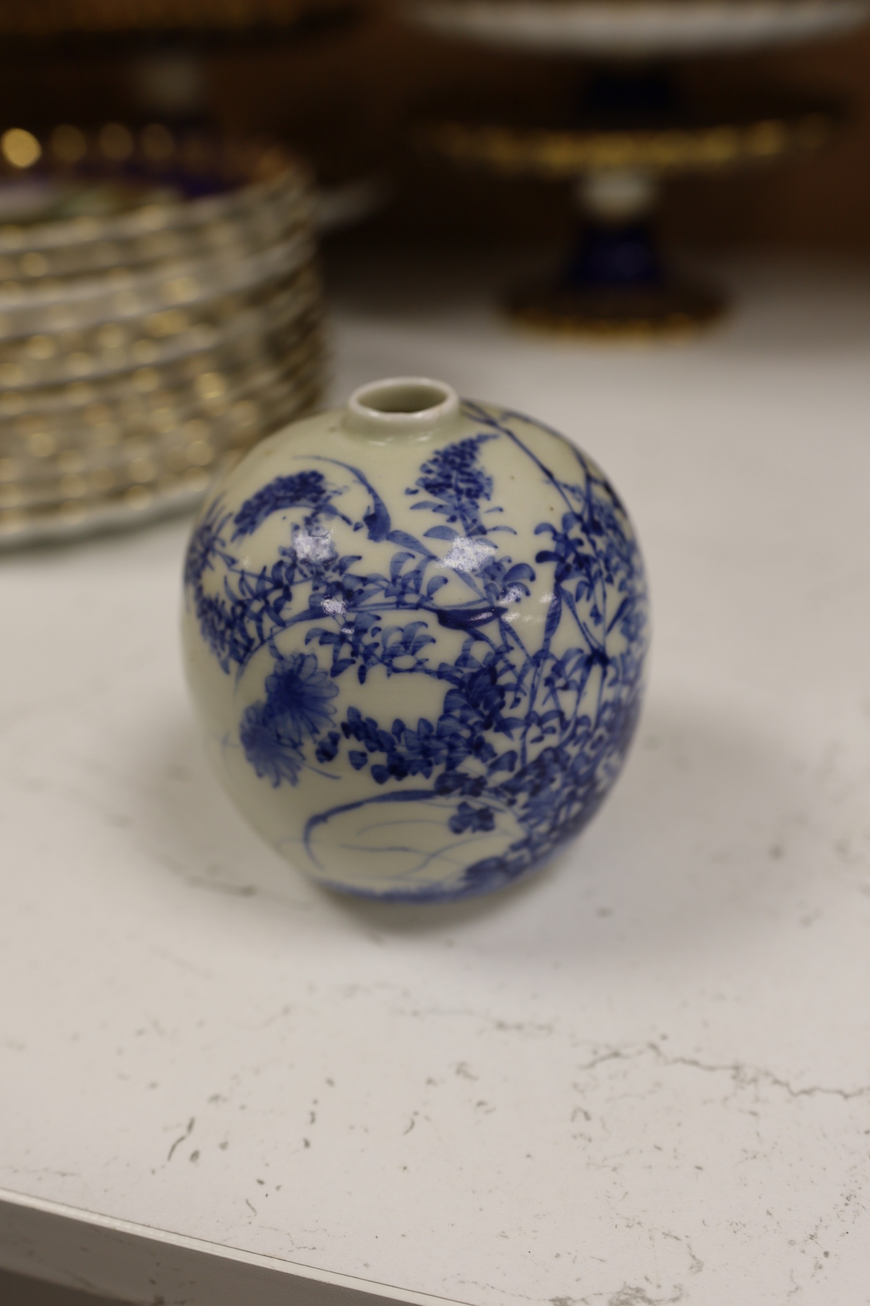 A Chinese polychrome glazed jar and cover, a Wangbinrong mark and a Japanese jar, jar and cover 14.5cm high. Condition - good